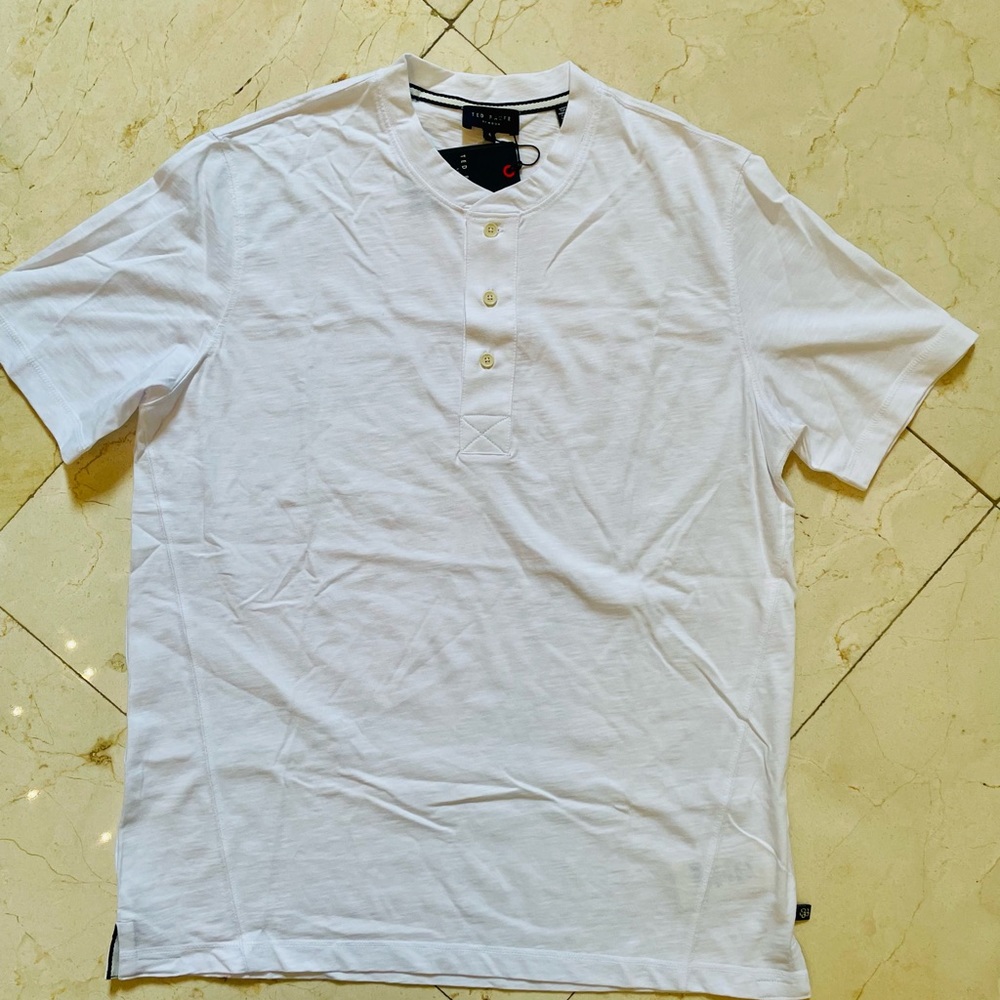 Brand new Ted Baker white tshirt with buttons. Very soft material.